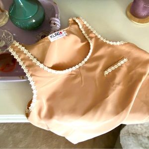 Cute & Flirty Tan/ Neutral Blouse; trimmed in white.